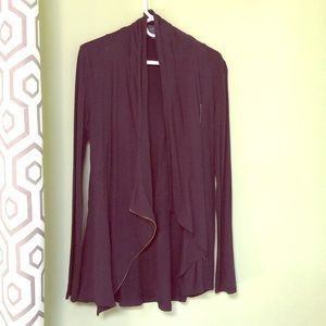 Asymmetrical zip-up.